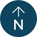 Compass navigation icon with upward arrow and letter N.